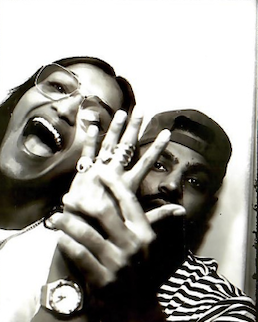 Poonam and Devin making peace signs